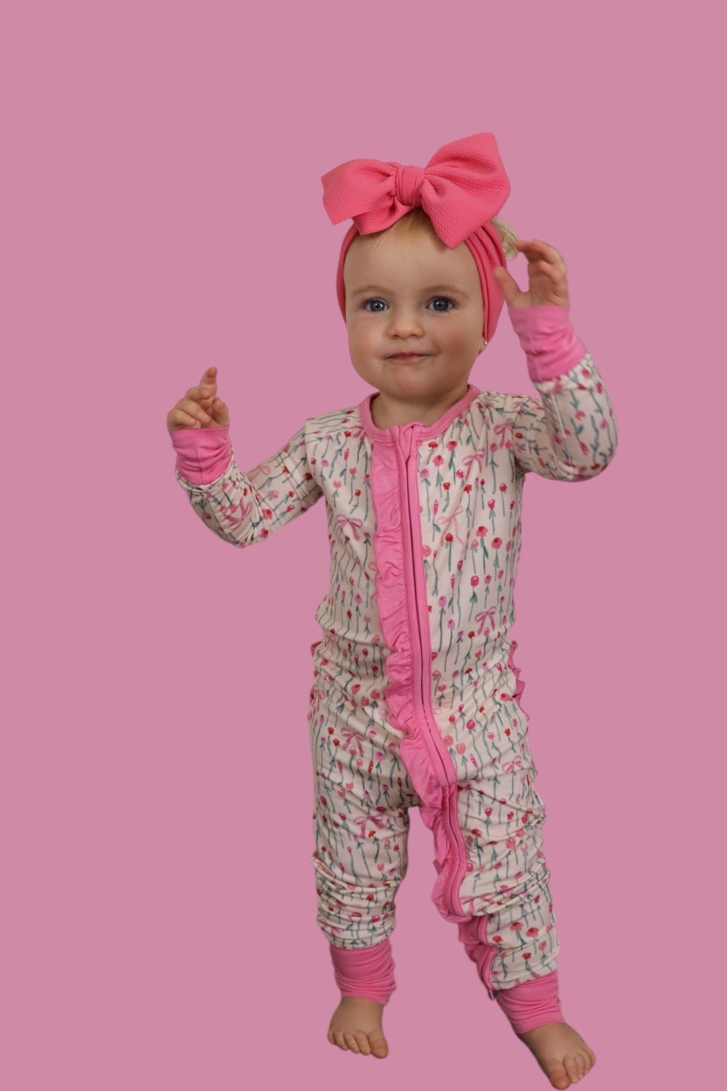 BLOOMS & BOWS DREAM FLORAL RUFFLE ZIPPER ROMPER