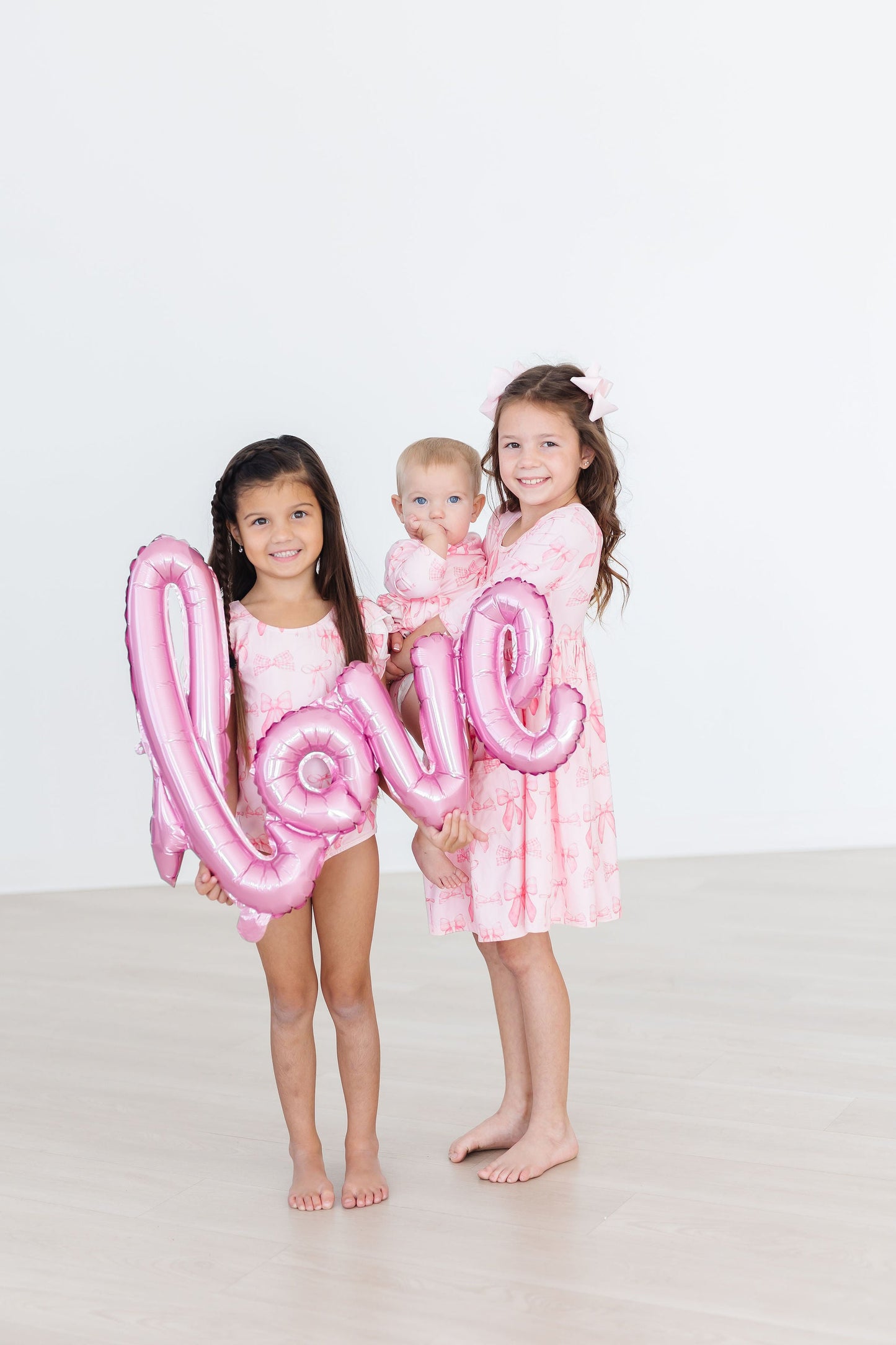 Blushing Bows 3/4 Sleeve Twirl Bodysuit Romper