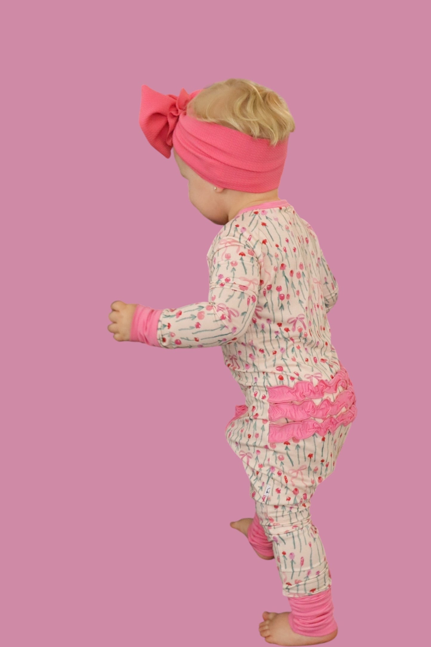 BLOOMS & BOWS DREAM FLORAL RUFFLE ZIPPER ROMPER