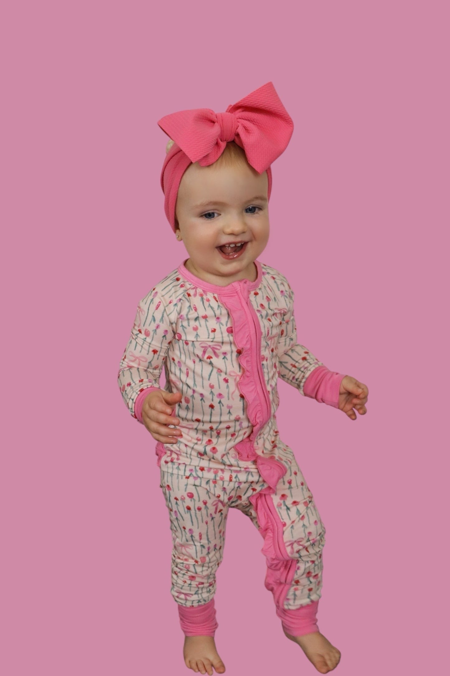 BLOOMS & BOWS DREAM FLORAL RUFFLE ZIPPER ROMPER