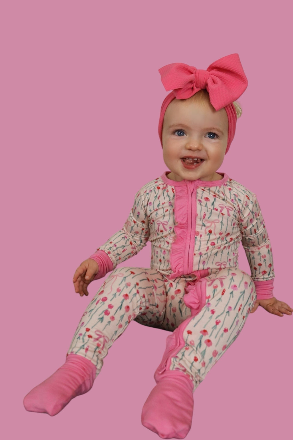 BLOOMS & BOWS DREAM FLORAL RUFFLE ZIPPER ROMPER