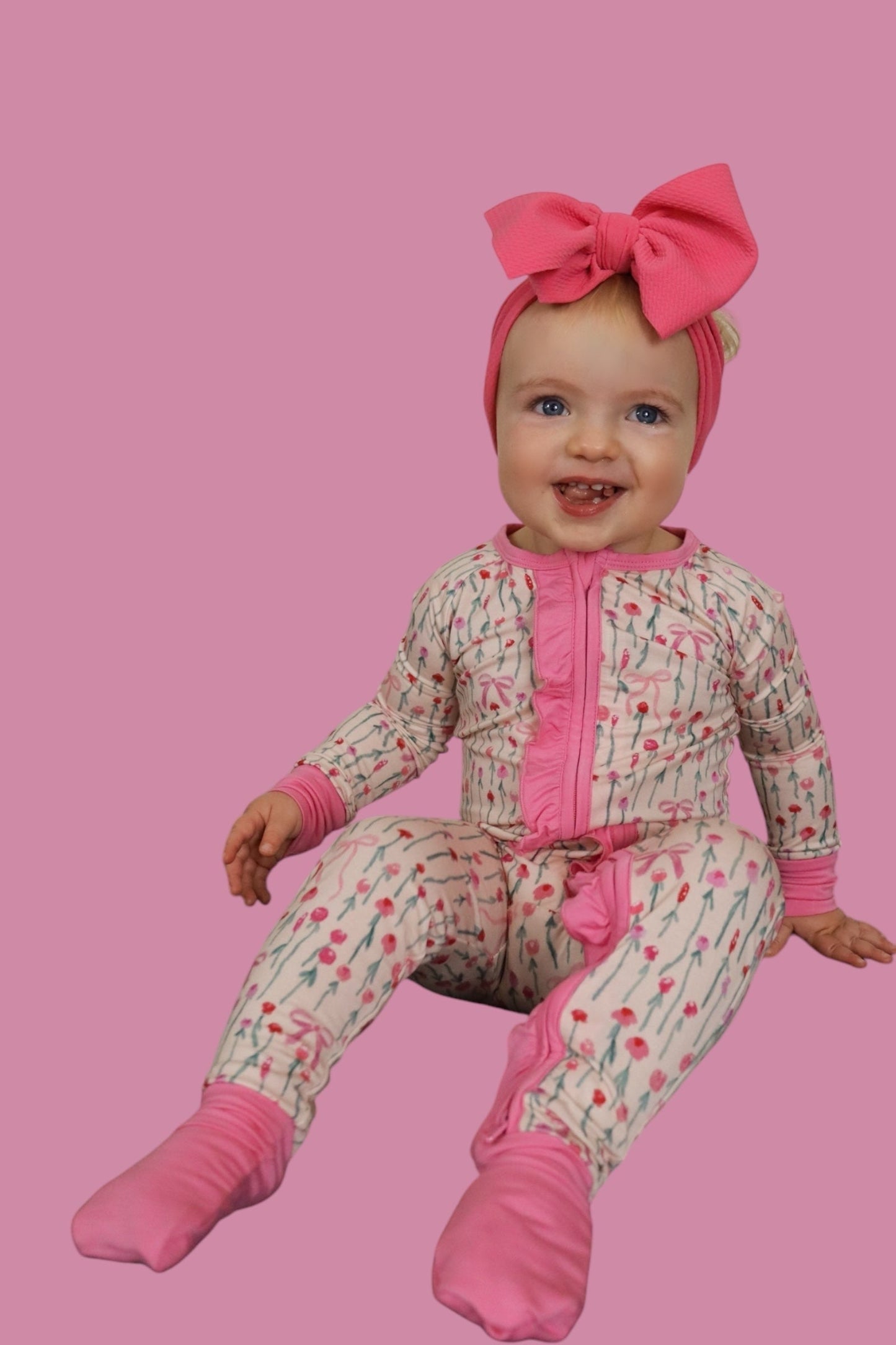 BLOOMS & BOWS DREAM FLORAL RUFFLE ZIPPER ROMPER