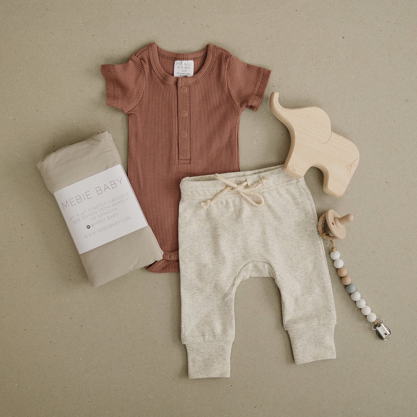 Dusty Rose Short Sleeve Organic Cotton Ribbed Snap Bodysuit Romper