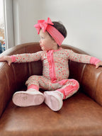 BLOOMS & BOWS DREAM FLORAL RUFFLE ZIPPER ROMPER