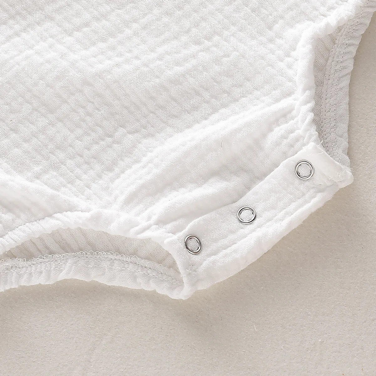 Sleeveless Muslin Bodysuit Romper