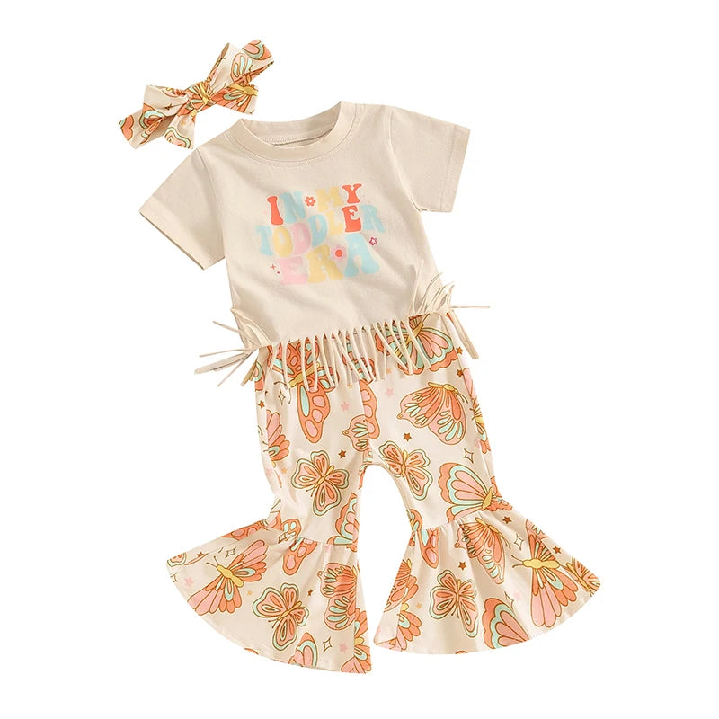 Toddler Girls 3Pcs Outfit Short Sleeve In My Toddler Era Letters Print Tasseled Top with Butterfly Print Flare Pants Headband Summer Set