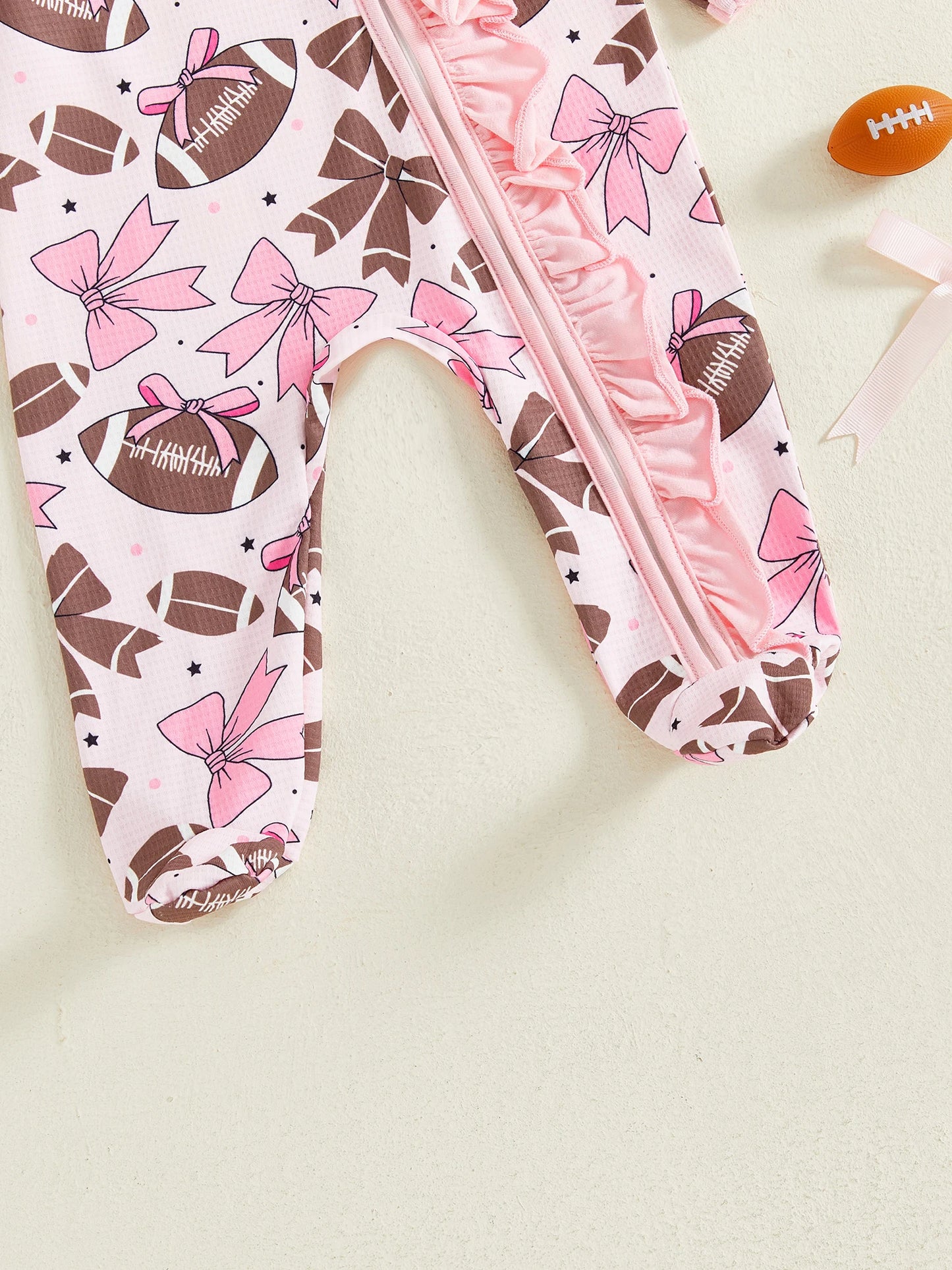 Baby Girl 2Pcs Footed Romper Fashionable Bow and Football Print Ruffled Long Sleeve Jumpsuit with Headband Set