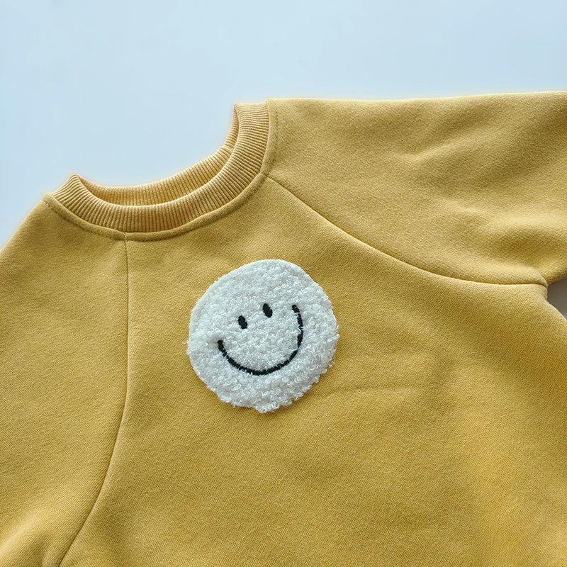 Fuzzy Smile Bodysuit Romper