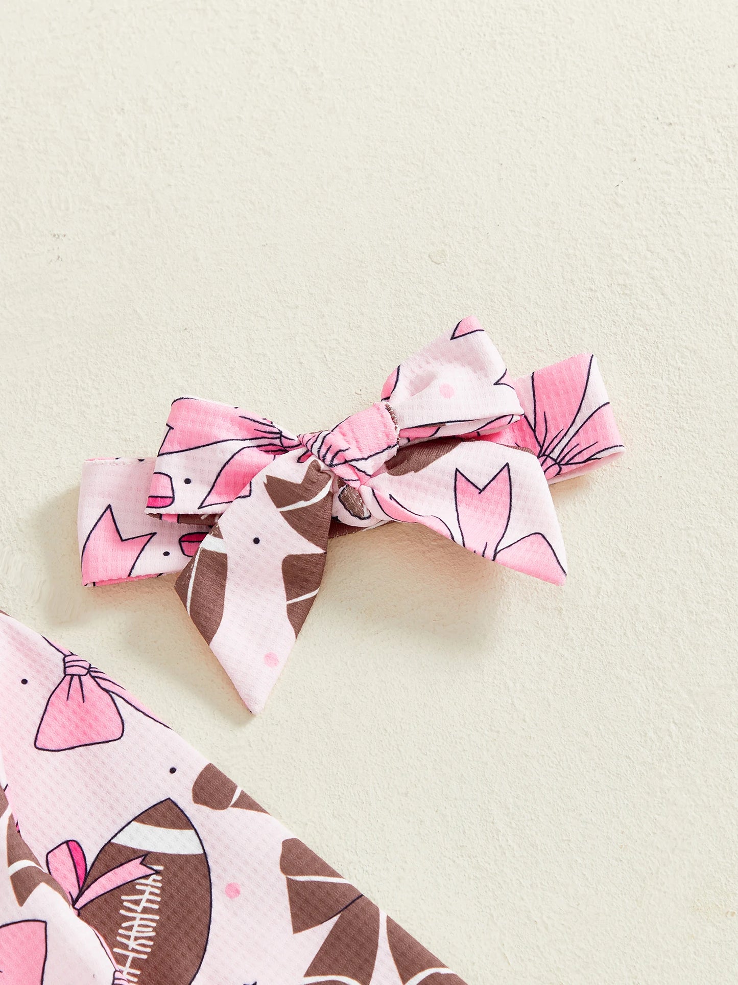 Baby Girl 2Pcs Footed Romper Fashionable Bow and Football Print Ruffled Long Sleeve Jumpsuit with Headband Set