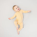 Larkspur Baby Zip Romper in Golden Sand