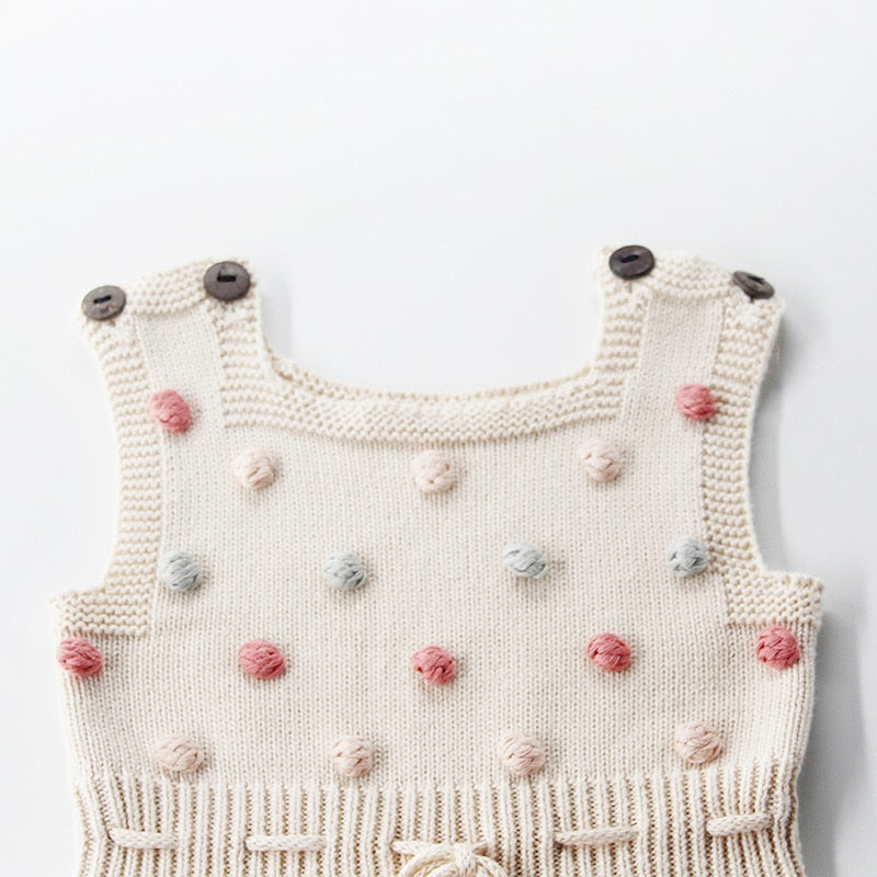 Knitted Baby Girl Romper with Colorful Pom Poms